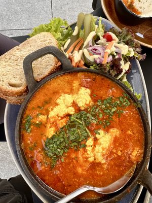 Breakfast egg dish made with tofu and grilled tomatoes  at Life Deli in Frankfurt