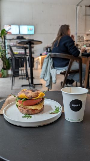 Sausage Egg and Cheese with a flat white at Beepublic in Brooklyn