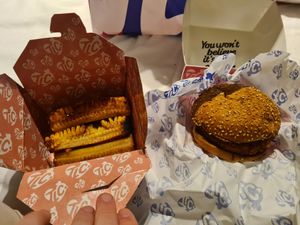 Left = corn ribs, right = OG burger at Taste Like Chicken TLC in Amsterdam