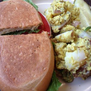 chicken salad sandwich and curry potatoes  at Gutenfleischers in Atlanta