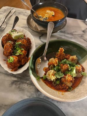 Soup, Cauliflower wings and dumplings  at Outra Espécie  in Porto