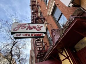 sign  at John's of 12th Street in New York City