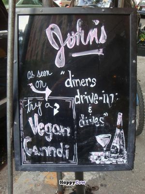 sign out front at John's of 12th Street in New York City