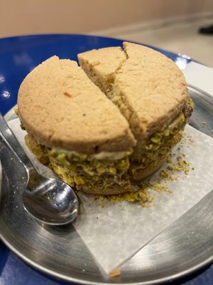 Pistachio ice cream alfajor - you might need to ask for this because it’s not written on the wall (but it is on the paper menu). at BelCreme Plant Based in Cordoba