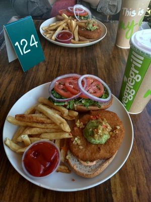 Burger with faux meat at Veggie Grill by Next Level in Long Beach