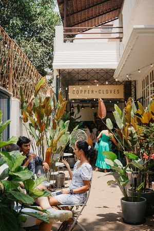 Leafy cafe on sunny days at Copper + Cloves in Bangalore