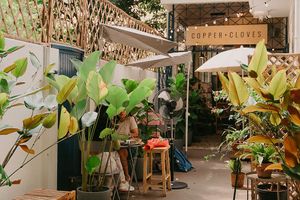 Sunny seating area outside at Copper + Cloves in Bangalore