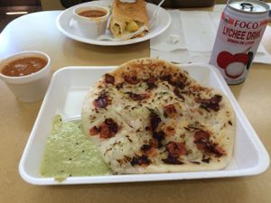 tomato and onion uthappam  at Dosa Hutt in Flushing