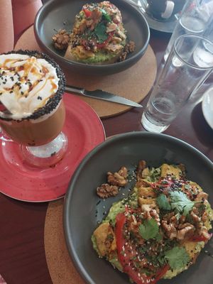 iced vanilla coffee? and avocado sandwich at A Padoca in Porto