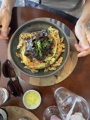 homemade bread open sandwich  at A Padoca in Porto