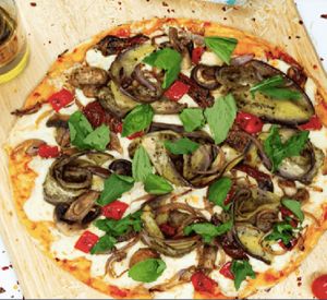 Pizza Jardinera 
Delicious baked eggplant, mushroom, roasted paprika and onion with mozzarella cheese over Neapolitan sauce, in traditional Creare dough. at Diverso Union de Cocinas in Medellin