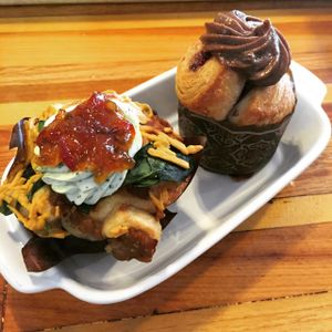 Vegan cruffins, with house marinaded tempeh, 'cheese', herbs, pepper jam & more! at Breads on Oak  in New Orleans
