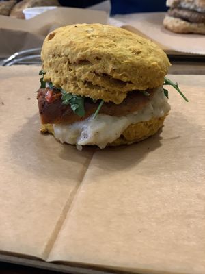Pumpkin Cheddar biscuit with andouille sausage  at Breads on Oak  in New Orleans