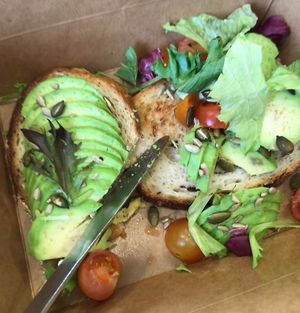 Avocado, fried tomatoes, lettuce and sunflower seeds on sourdough bread  at Squeeze Cafe & Deli in Hebden Bridge