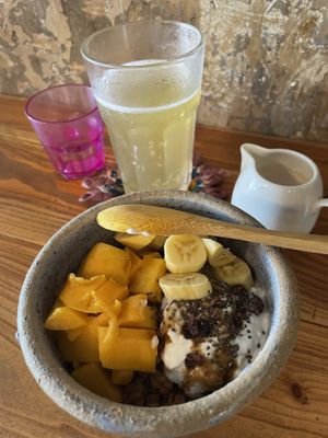 Granola in the bowl, kombucha in the glass   at Limau Limau Cafe in Malacca