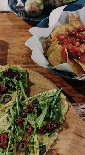 Vegan nachos y pesto chesse vegan naan at Coco Cafe & Ice Cream in 