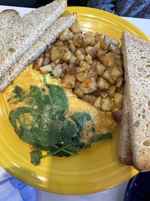 Vegan Popeye omelette   at Smile of the Beyond in Jamaica