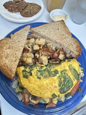 Vegan Aumlette Supreme and soy sausage side. Vegan butter available upon request   at Smile of the Beyond in Jamaica