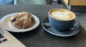 Soy latte and raspberry scone  at Herkimer Coffee in Seattle