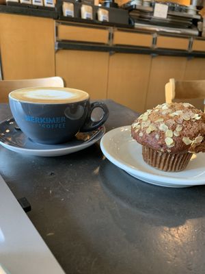 Oat latte and banana ginger muffin  at Herkimer Coffee in Seattle