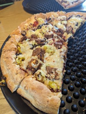 Dairy-free cheese CYO with vegan pepperoni, pepperoncini, pineapples, and olives at Spiro's Pizza and Pasta in Port Orchard