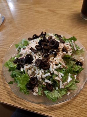 Side salad with vegan cheese at Spiro's Pizza and Pasta in Port Orchard