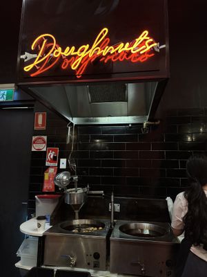 Frying the donut balls   at Lukumades in Chippendale