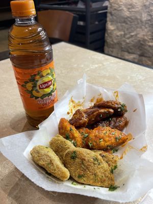Wings and drink   at Straight Outta Plantz (S.O.P-STL) in St Louis