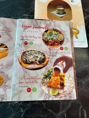 NOT vegan food but with vegan sign😒  at Lekker Cafe' in Krabi