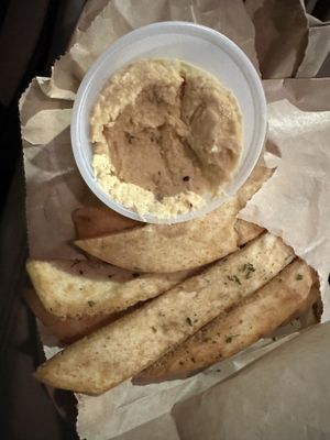 Pita bread with hummus   at Spitz in Frisco