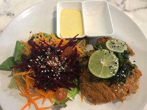 a crispy vegan meat with salad and tasty sauces at May Veggie Home Express - ประสานมิตรพลาซ่า in Bangkok