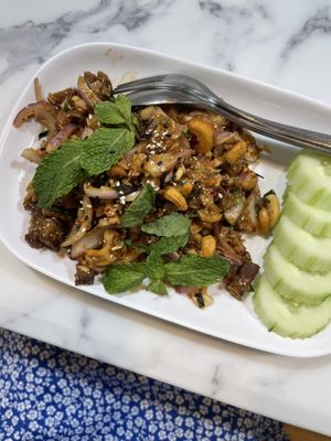 Yam Sapp Gai Grob - plant based meat in spicy sour sauce - must order   at May Veggie Home Express - ประสานมิตรพลาซ่า in Bangkok