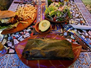 Tamal veggie acompañado de ensalada at Sativa Studio Cafe in Banos