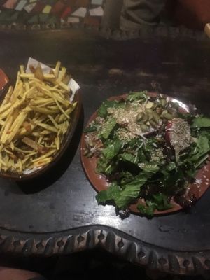 the “small” salad and “small” fries ... at Sativa Studio Cafe in Banos