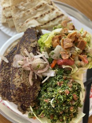 Impossible meat with rice, two sides, flatbread, and tahini sauce. It was enough for 3 meals. The meat was heavily seasoned and delish  at Furnsaj in San Diego