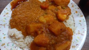 Vegan curries and rice at This & That Cafe in Manchester