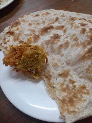 Bhaji and chapati at This & That Cafe in Manchester