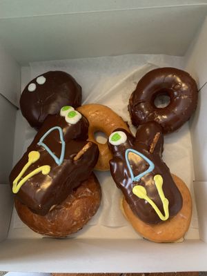 Voodoo doll, plain glaze, Apple fritter, Portland Cream, chocolate ring - all vegan  at Voodoo Doughnut in Portland