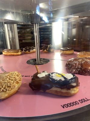 Voodoo Doll (Vegan Options on Bottom) • Display Case  at Voodoo Doughnut in Portland