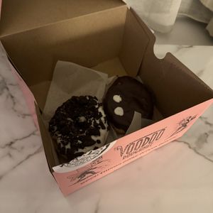 Vegan Dirt Doughnut (left) & Vegan Portland Cream Doughnut (right)  at Voodoo Doughnut in Portland