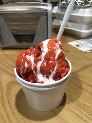 Soy-cream based ice cream (flash frozen with nitrogen) with raspberry flavor and marshmallow sauce, cherries, rainbow sprinkles.  at Sub Zero in Manchester