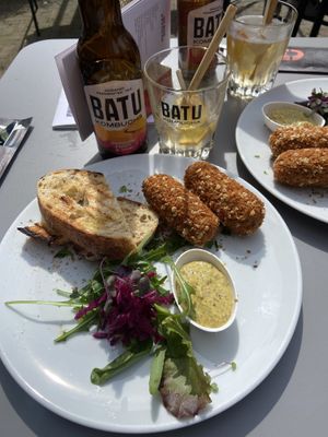 Vegan mushroom kroketten with passionfruit kombucha   at MIMIK Film Theater Café in Deventer