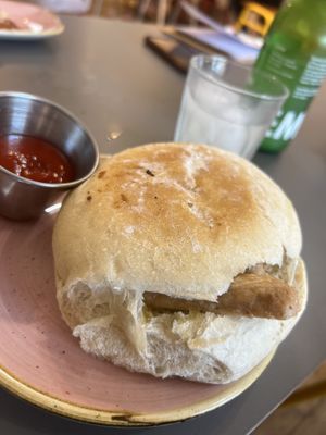 Vegan sausage sarnie  at Pink Lane Bakery - Acorn Rd in Newcastle Upon Tyne
