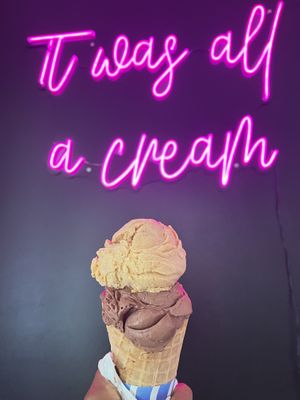 Vegan chocolate and vegan pumpkin ice cream on a vegan waffle cone  at Scratch Ice Cream in Brookfield