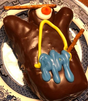 Pictured here is a vegan Voodoo Doll Doughnut  at Voodoo Doughnut Too in Portland