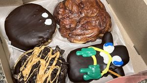 A box of VooDoo Donuts  at Voodoo Doughnut Too in Portland