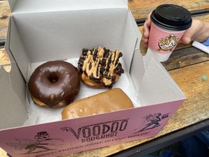 Vegan doughnuts and black coffee at Voodoo Doughnut Tres in Eugene