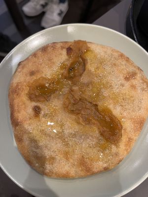 Focaccia filled with onions, tomatoes and beans  at Tone Milano in Milan