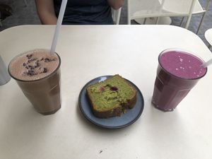 Two smoothies and the matcha cherry cake  at roots - Münstergasse in Zurich