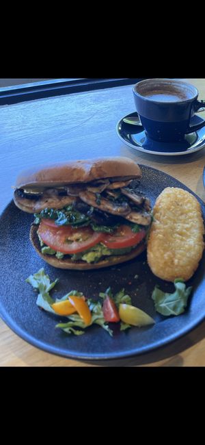 Vegan smashed avo, mushroom, pesto bagel  at Coca bar in Maroochydore